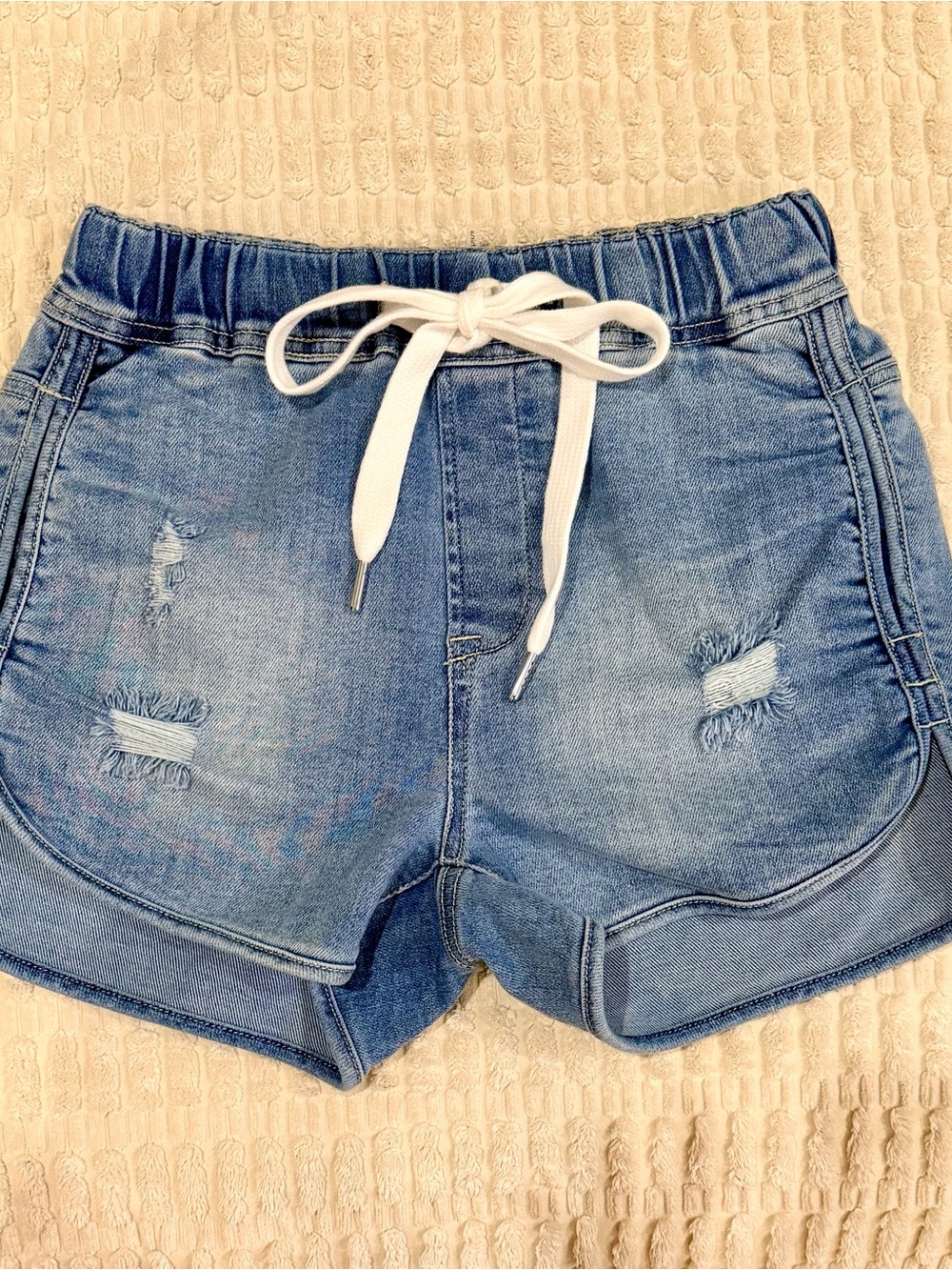 Women’s Light Blue Distressed Denim Drawstring Shorts